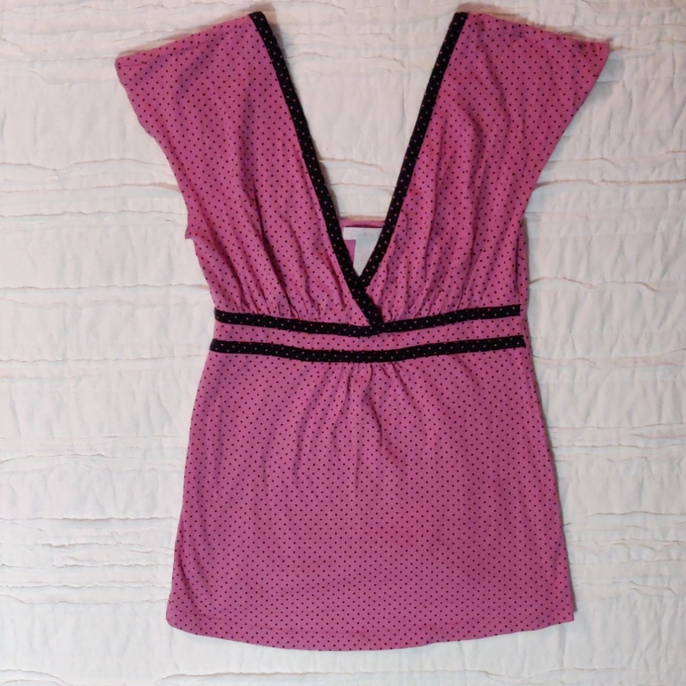 Pink and black polka dot shirt